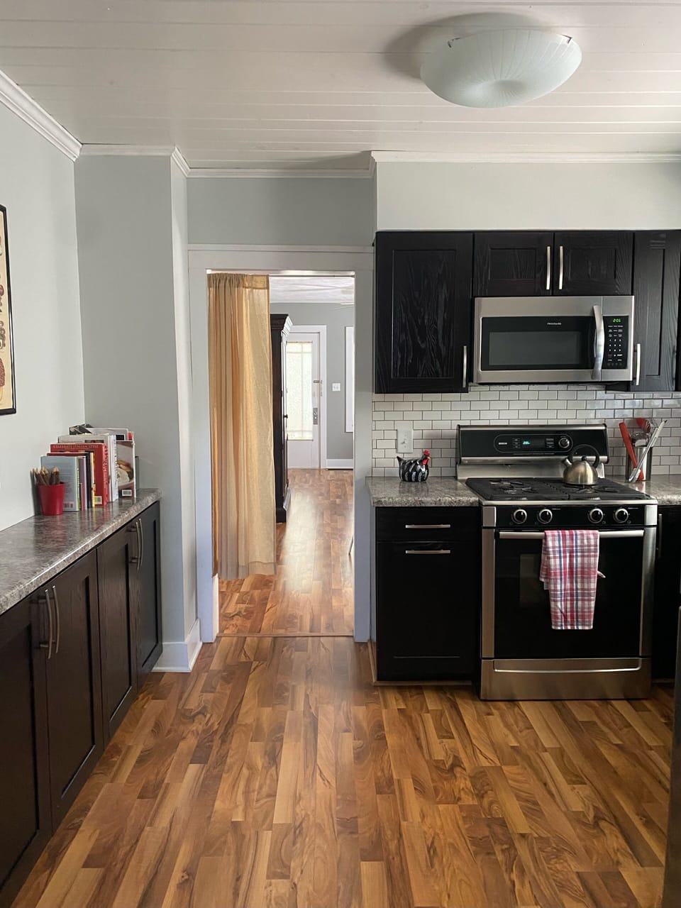 Kitchen with duel-fuel Bosch range and Bosch dishwasher.
