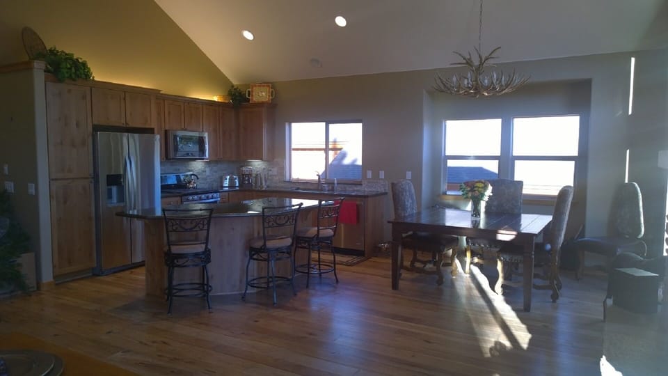 Kitchen and Dining Area comes with seating around the table for 8 plus bar stool