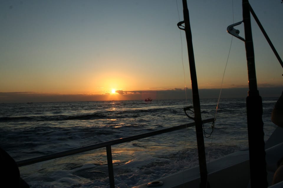 SUNRISE ON DEEPSEA FISHING BOAT
