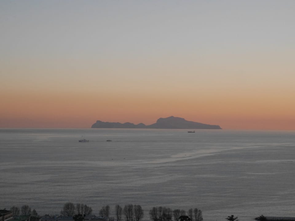 Island of Capri at sunset. Taken outside in front of the apartment building