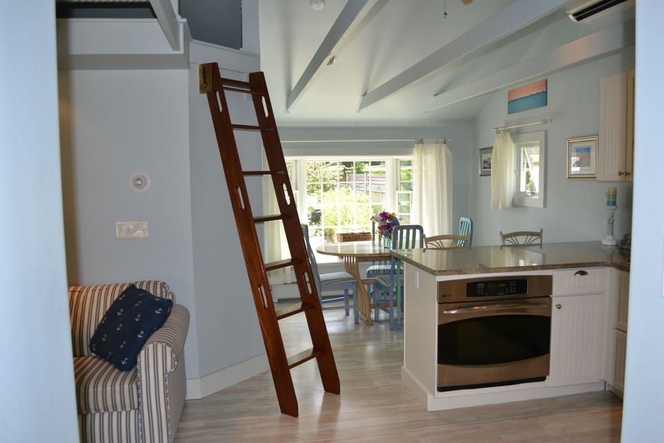 ships ladder accesses carpeted loft for storage