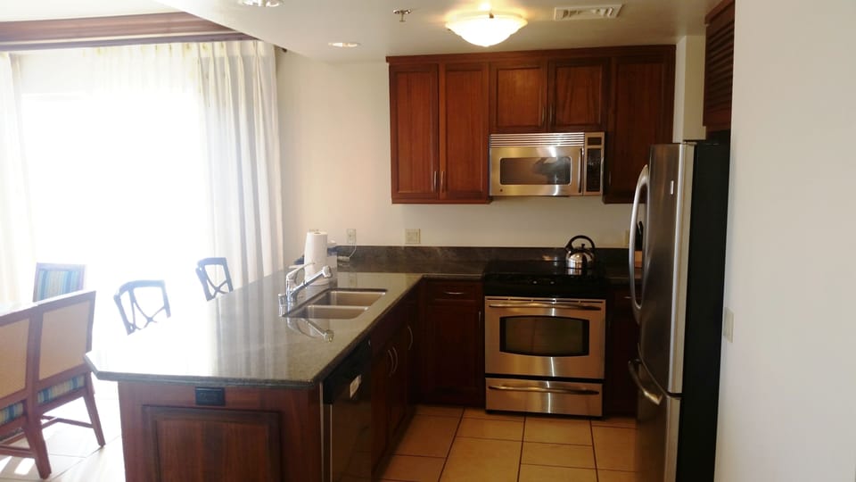 Kitchen overlooks dining room