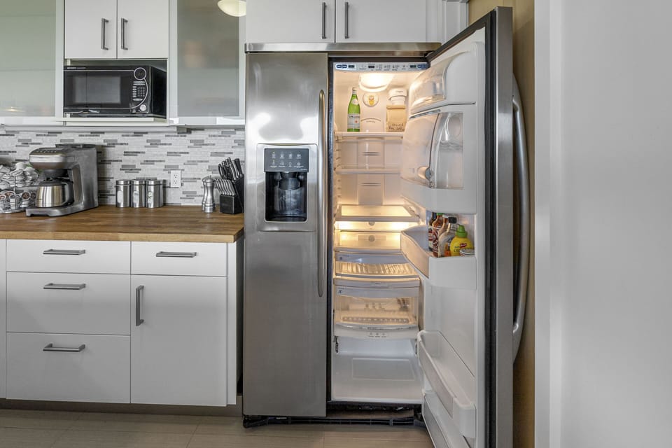 Clean spotless refrigerator with icemaker.