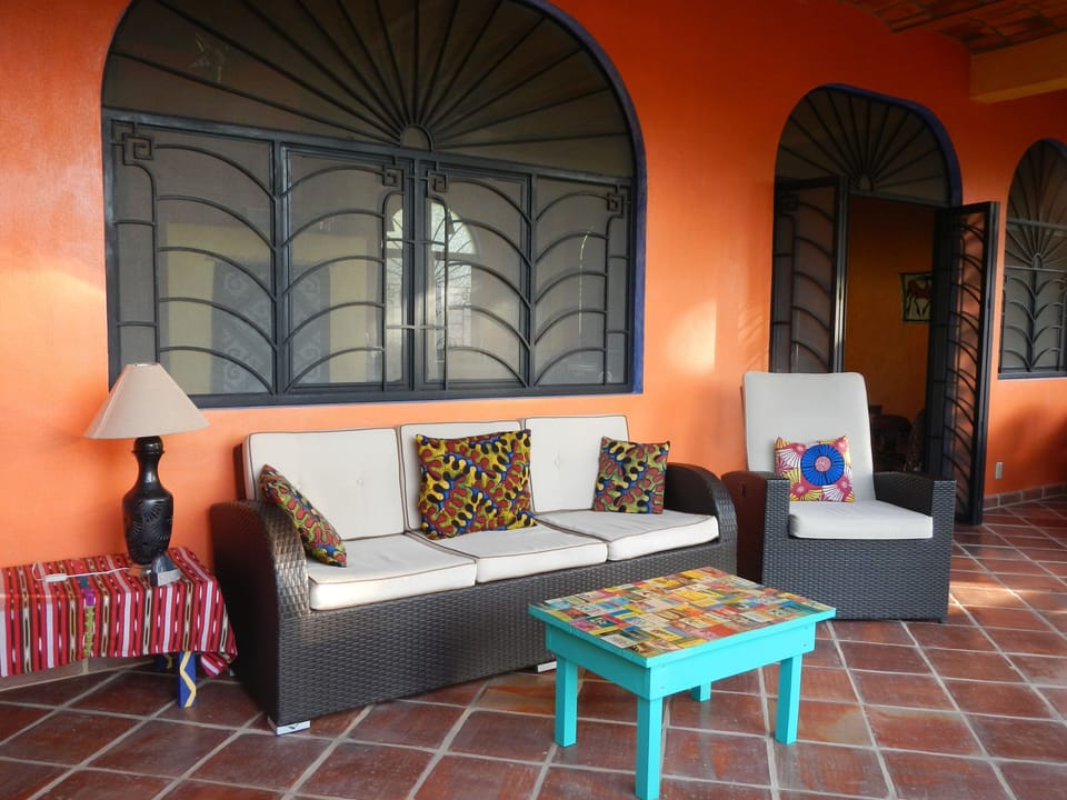 seating on porch off of kitchen/living room