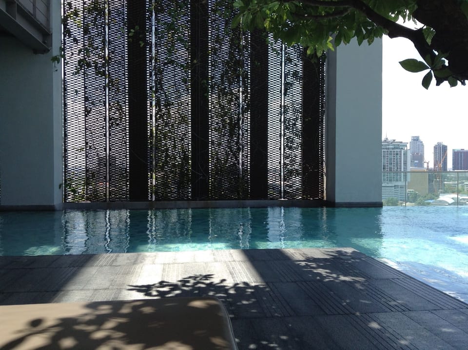 Shade and cool breeze at the 10th floor pool