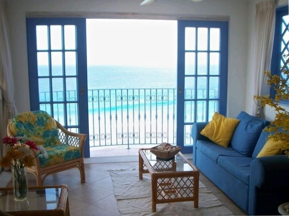 The enclosed solarium with its beautiful ocean views, sounds, and breeze