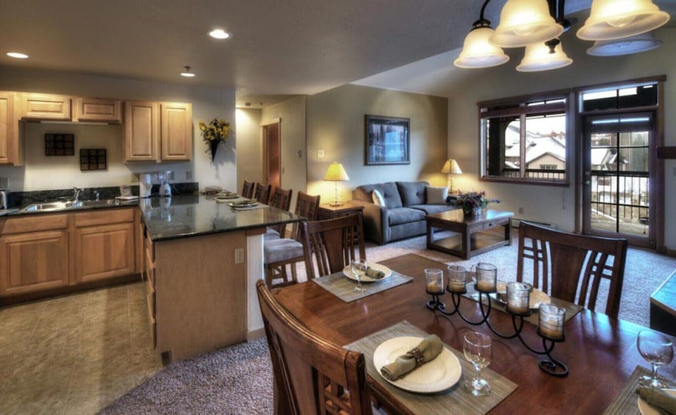 Master unit with full kitchen, dining area and living area.