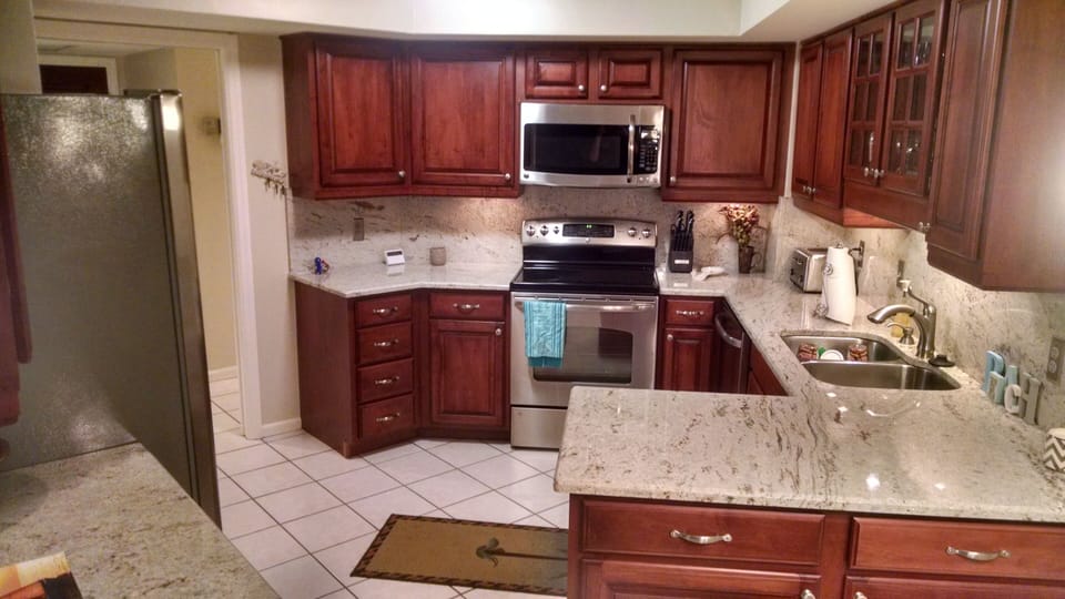 Kitchen with stainless steel appliances and granite counter tops