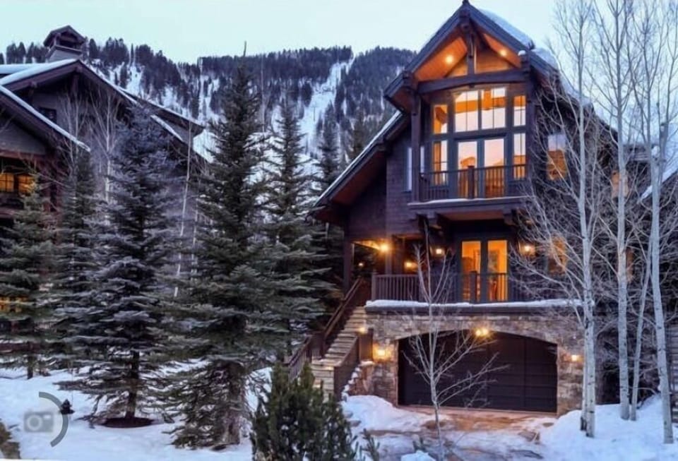 The structure you see next to the house is the Ritz Carlton. Slopes in the back.