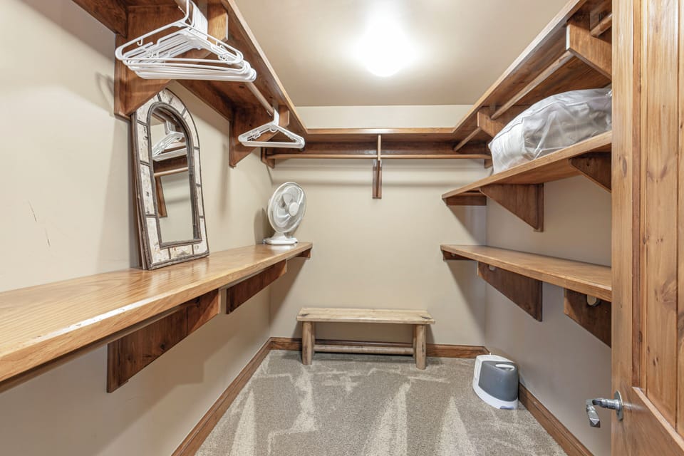 Large, walk in first master bedroom closet.