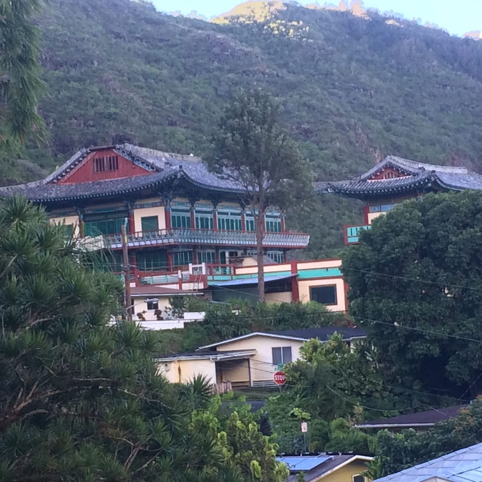 Nearby Buddhist temple at sunrise.