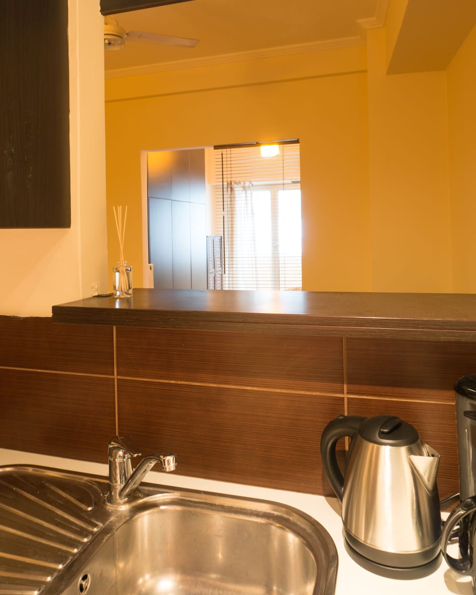 View from kitchen counter to bedroom