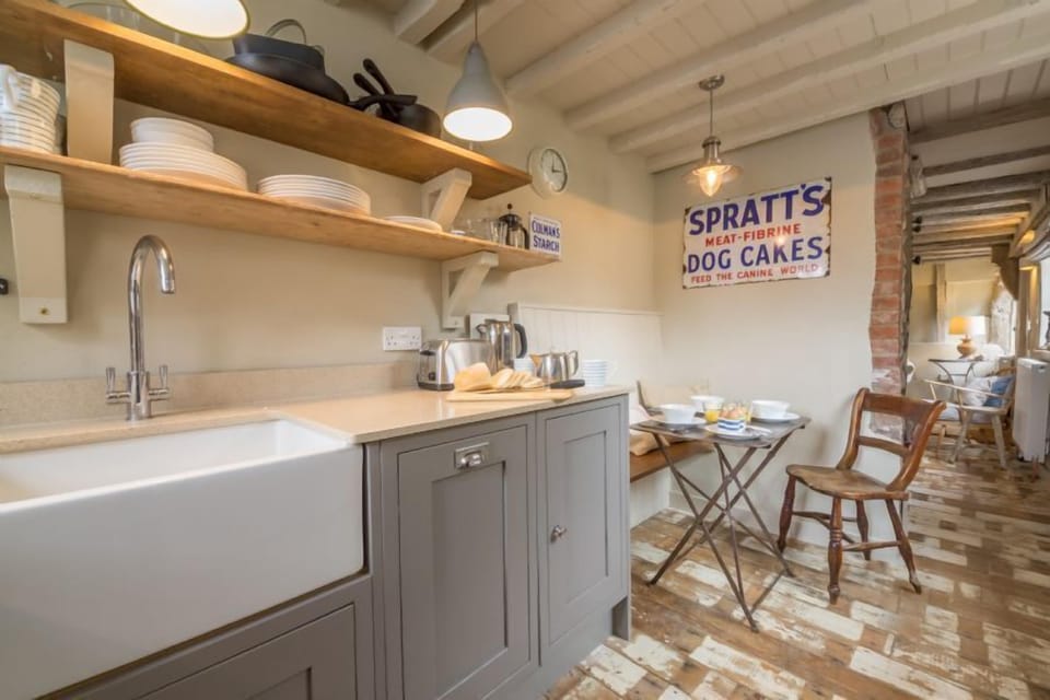 Ground floor: Well-equipped kitchen looking to dining area