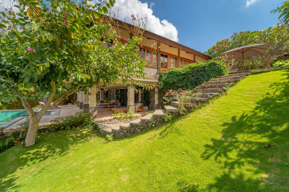 stairs from the top terrace towards the pool area and terrace