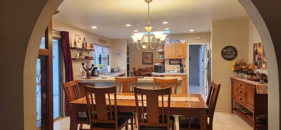 Looking into dining room and kitchen from living room.