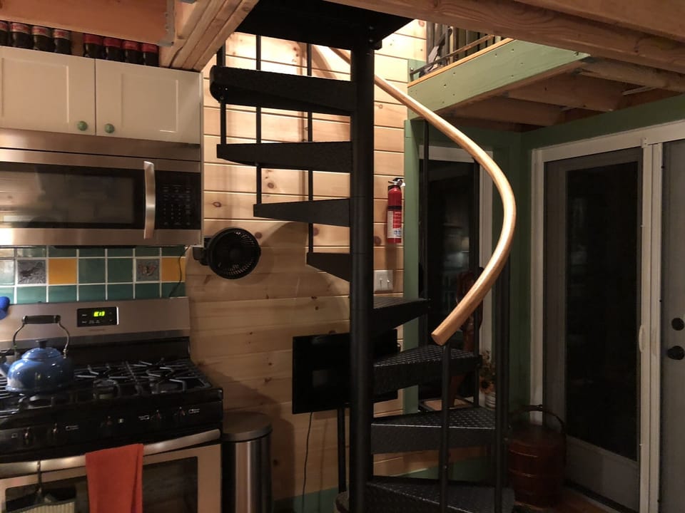 Spiral staircase to the upstairs loft bedroom & office nook