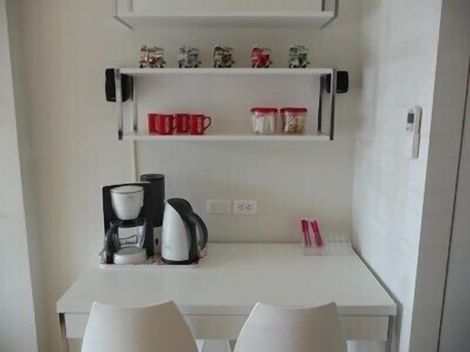 Desk, coffeemaker and kettle