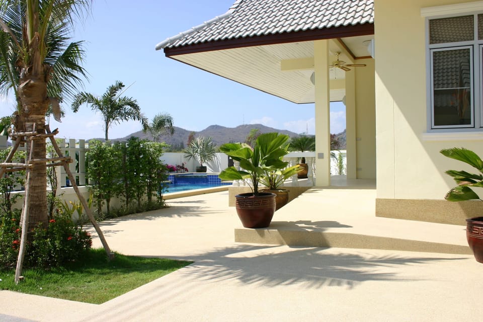 Wheelchair access ramp to covered veranda and front door.