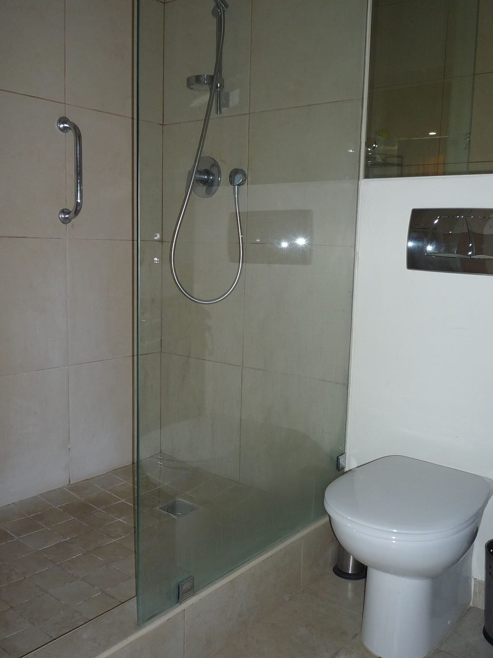 En -suite bathroom with walk in shower
