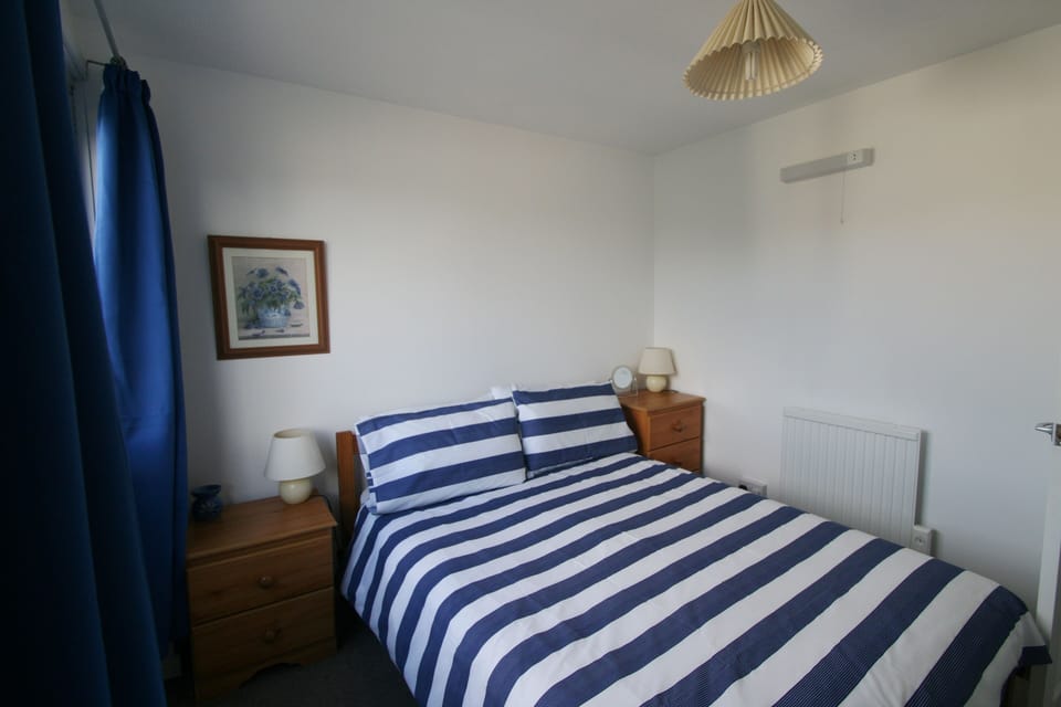 double bed in bedroom 1