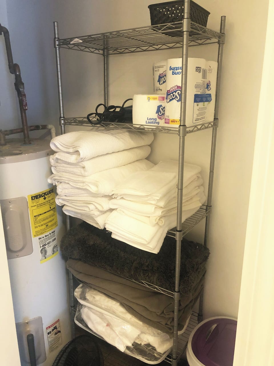 Fully stocked bathroom - towels and extra sheets, extra storage