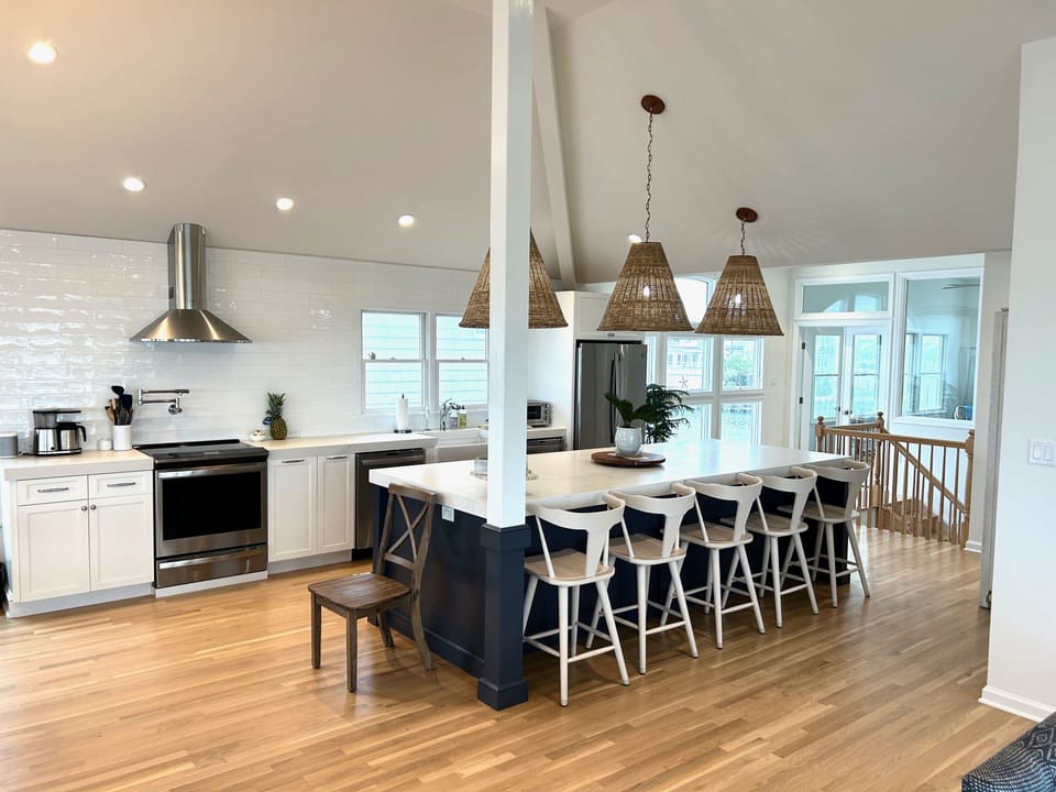 Newly renovated kitchen. Induction oven. Two dishwashers. Quartz countertops. 