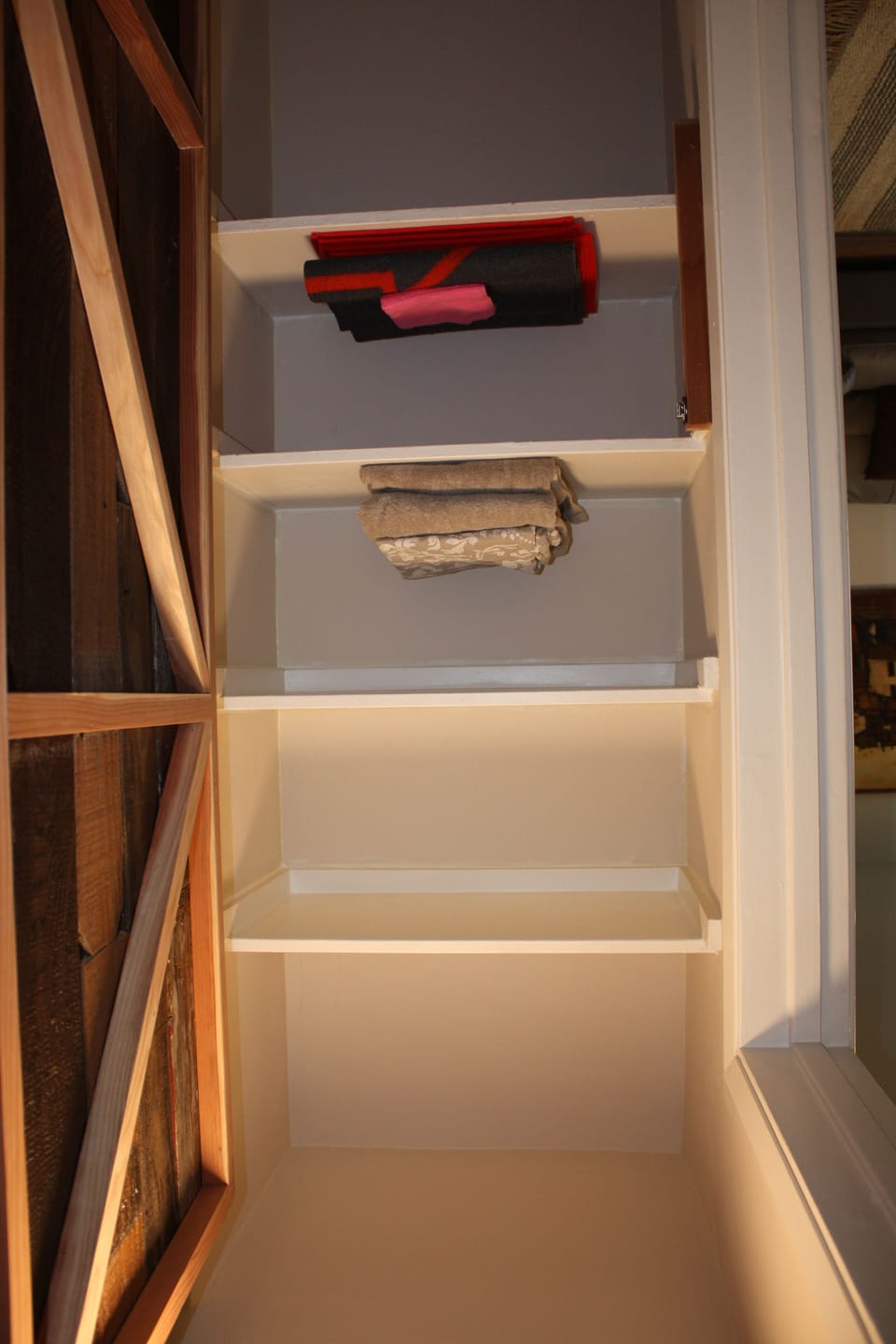 linen closet open.