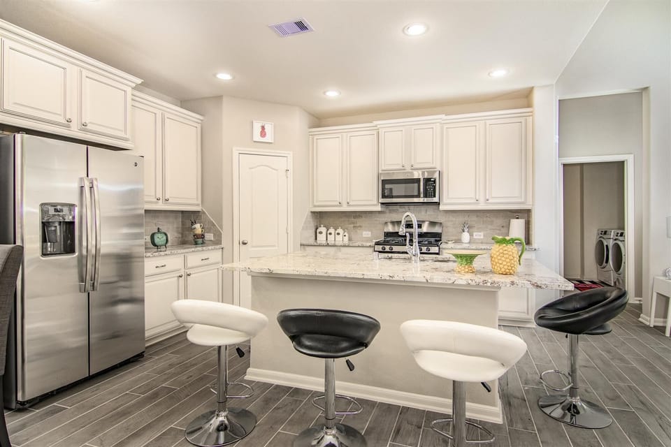 Full Modern Kitchen with Full Laundry Room in the back 