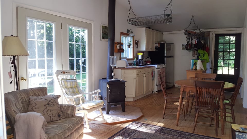 Cozy living space, with lots of windows to enjoy the lake!