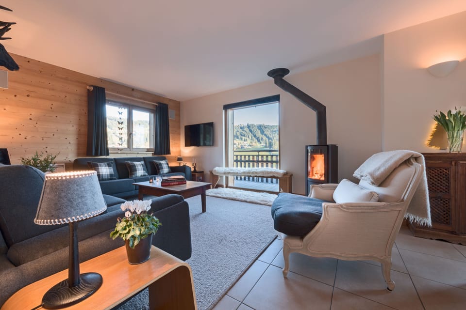 Main reception with wood burner and stunning piste views