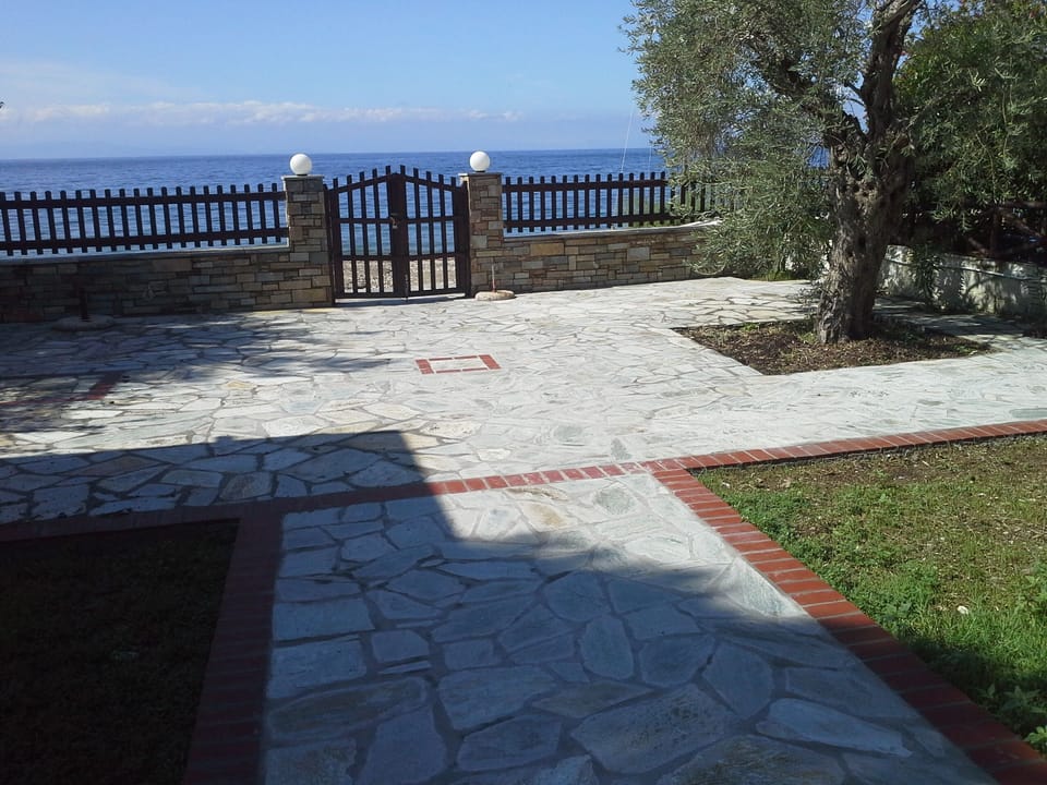 Stoned pathway and private area next to beach for sunning  and relaxing