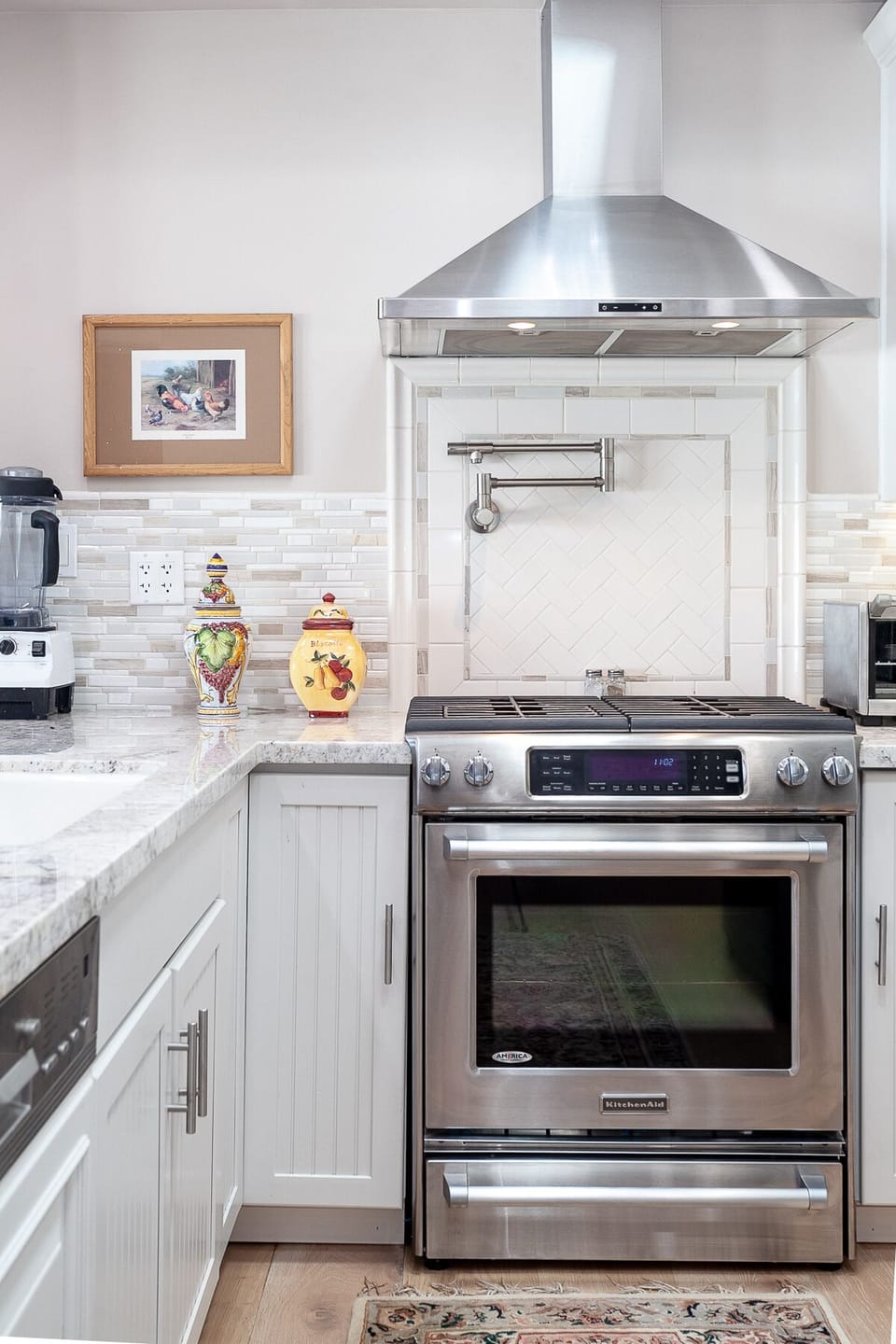 Dual fuel stove with pot filler