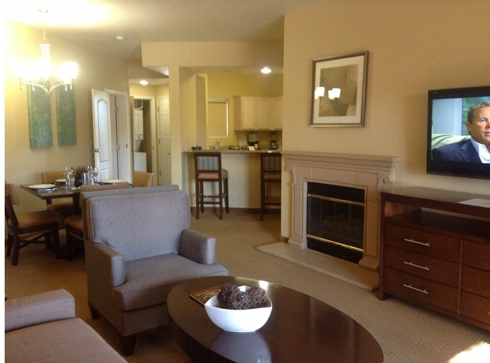 Beautiful newly furnished living & dining rms. with  wall TV and cozy fireplace