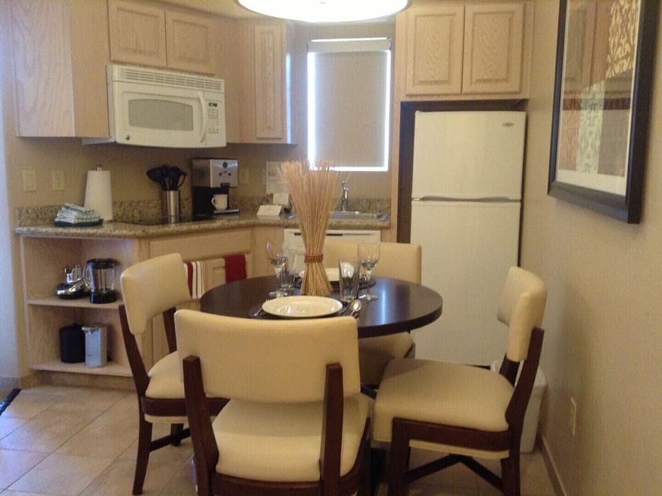 Privacy studio suite with frig, cook-top burners, microwave, dishwasher & eating