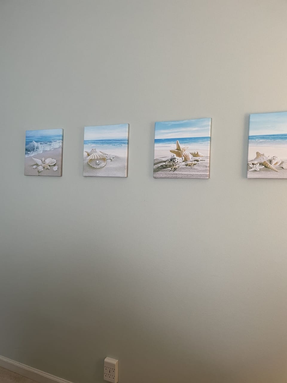 Beach art next to the bed