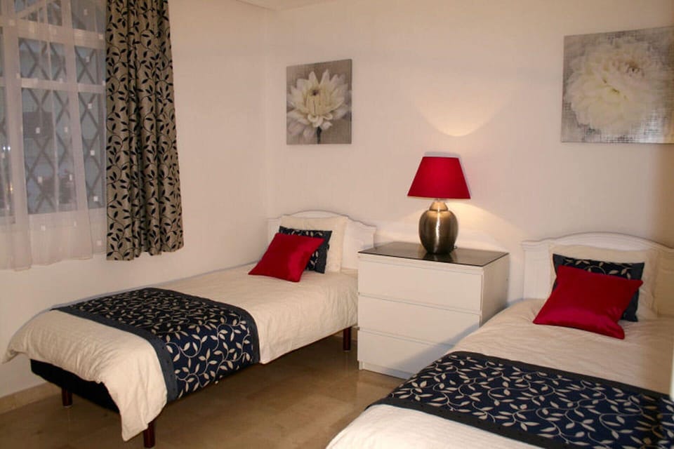 Twin beds extra long, bathroom with shower, bath