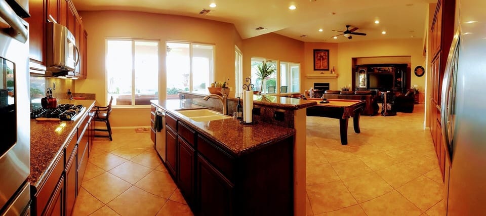 Kitchen, looking out over the great room.