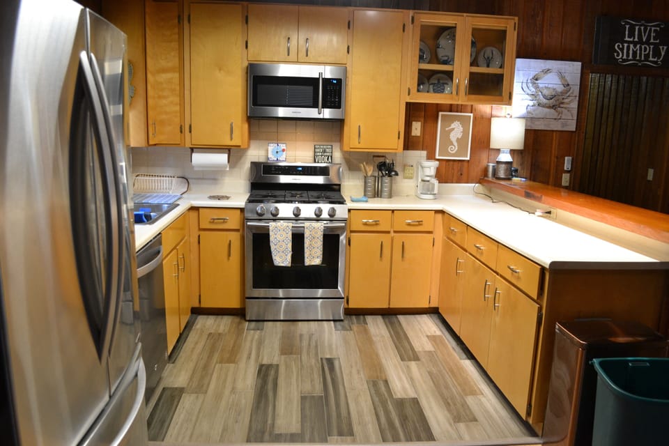 Brand new appliances in kitchen; gas stove 