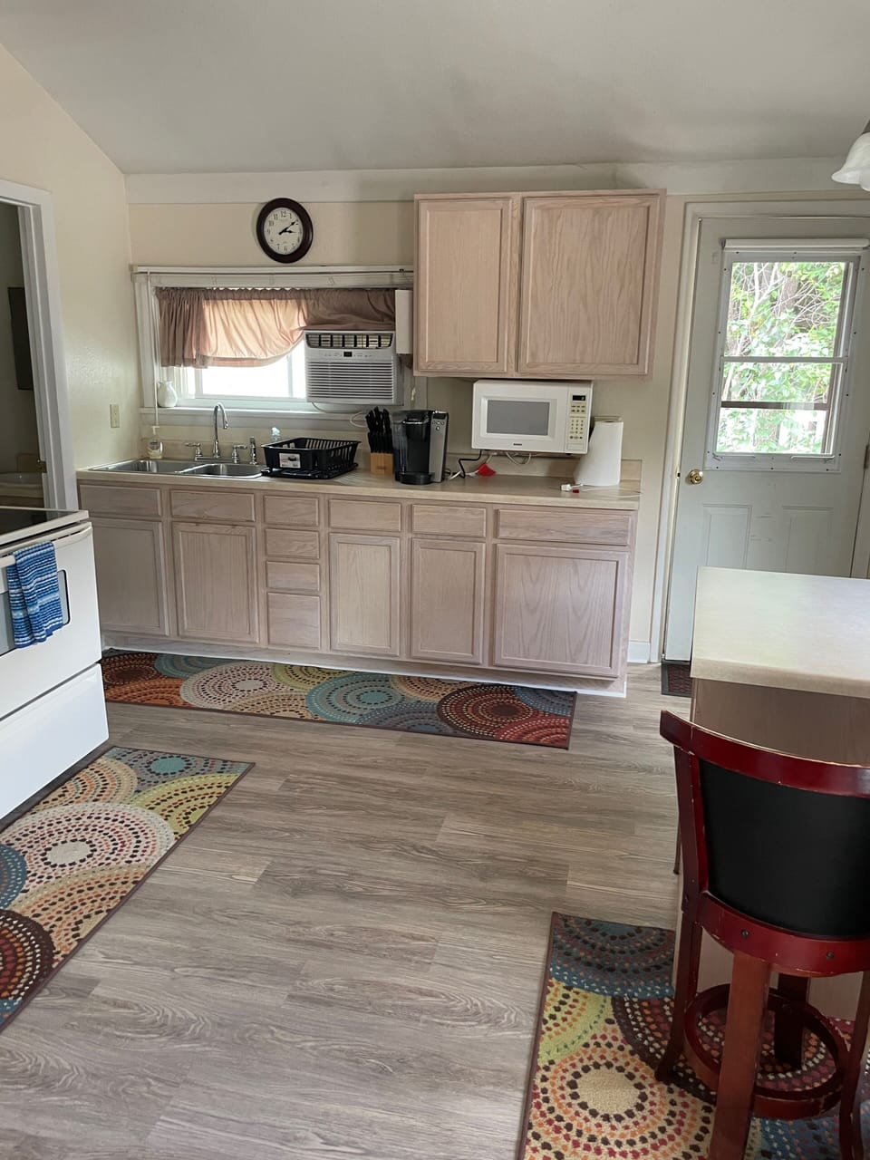 Living area looking into kitchen