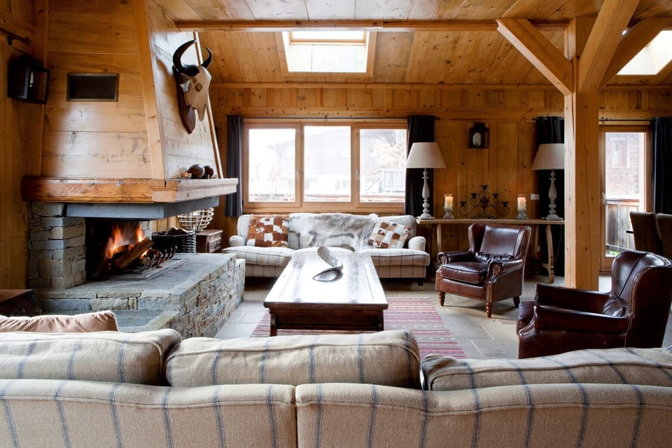 Log burning fireplace creates focal point of seating area