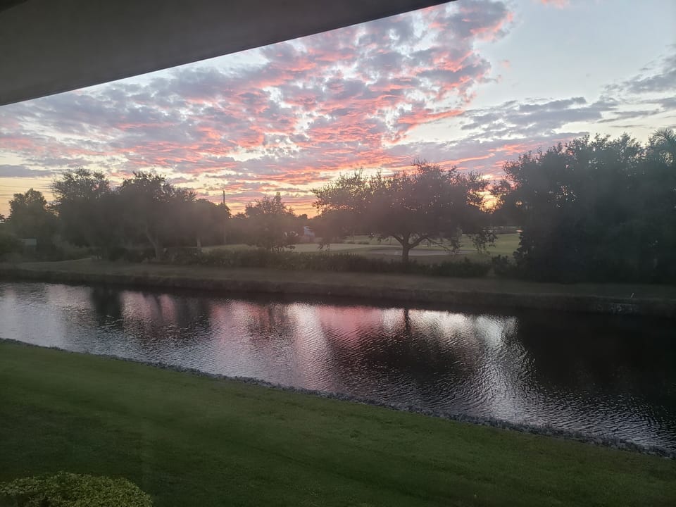 Sunrise from the lanai overlooking the canal and Hibiscus golf course! 