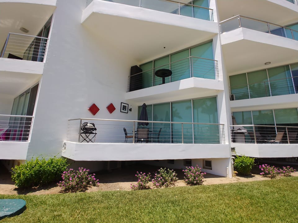 View  of the condo from pool walkway 