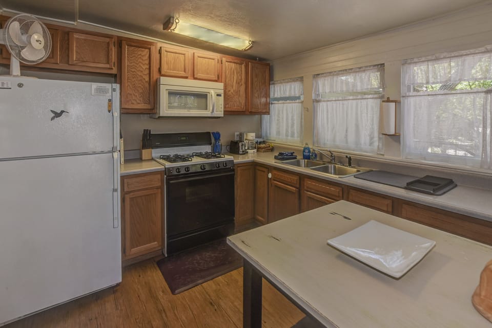 Fully equip kitchen with garden views
