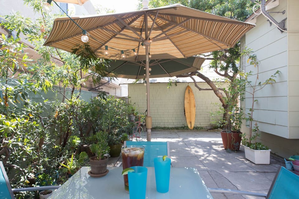 Enjoy a cold glass of ice tea in our garden retreat!