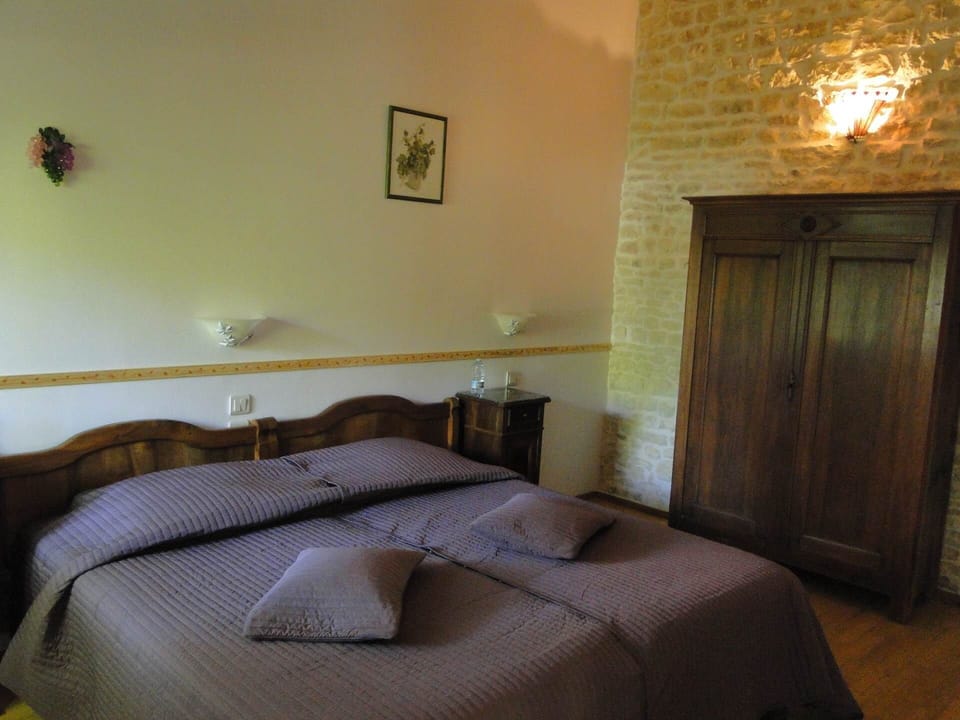 La chambre Vignes aménagée en un lit double de 180 de large