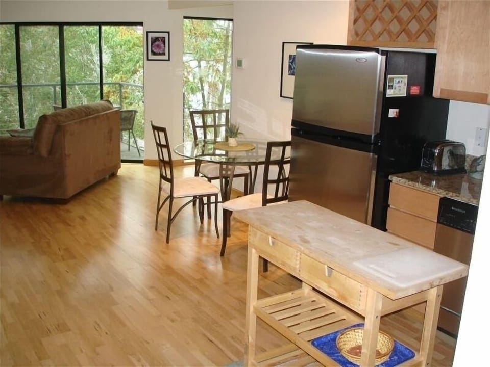 View toward living room & 2nd deck (river view). Builtin desk to left(not shown)