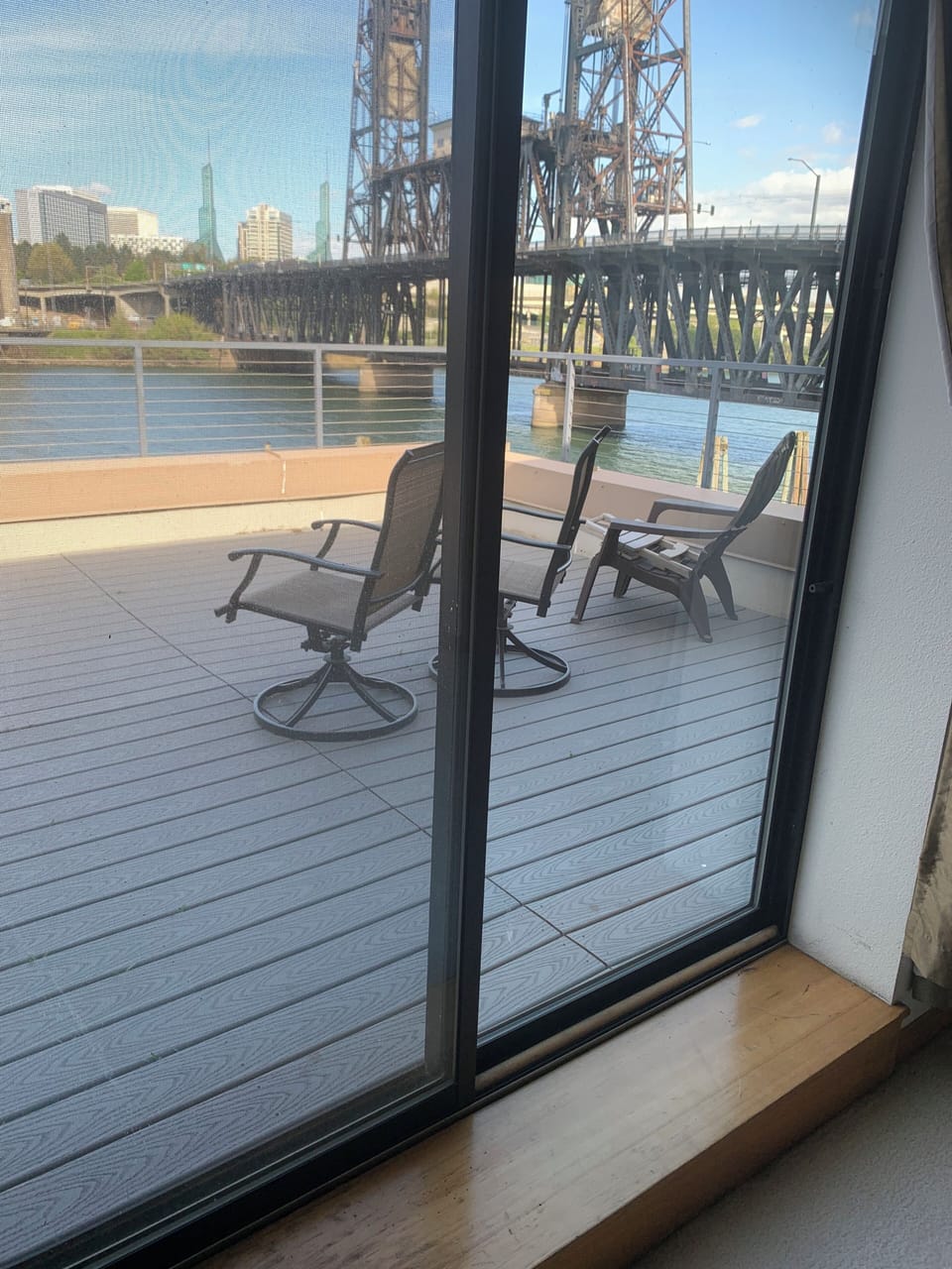 Upper bedroom-- connects to large private deck (~275sqft) overlooking the river.