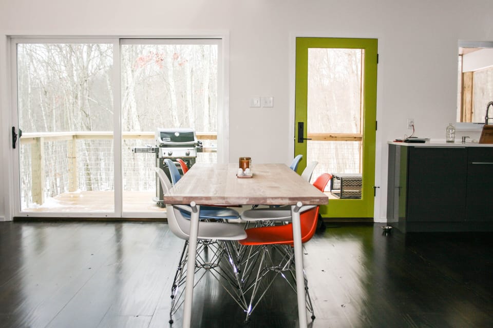 Dining area with 8 foot table for banquet-style dining
