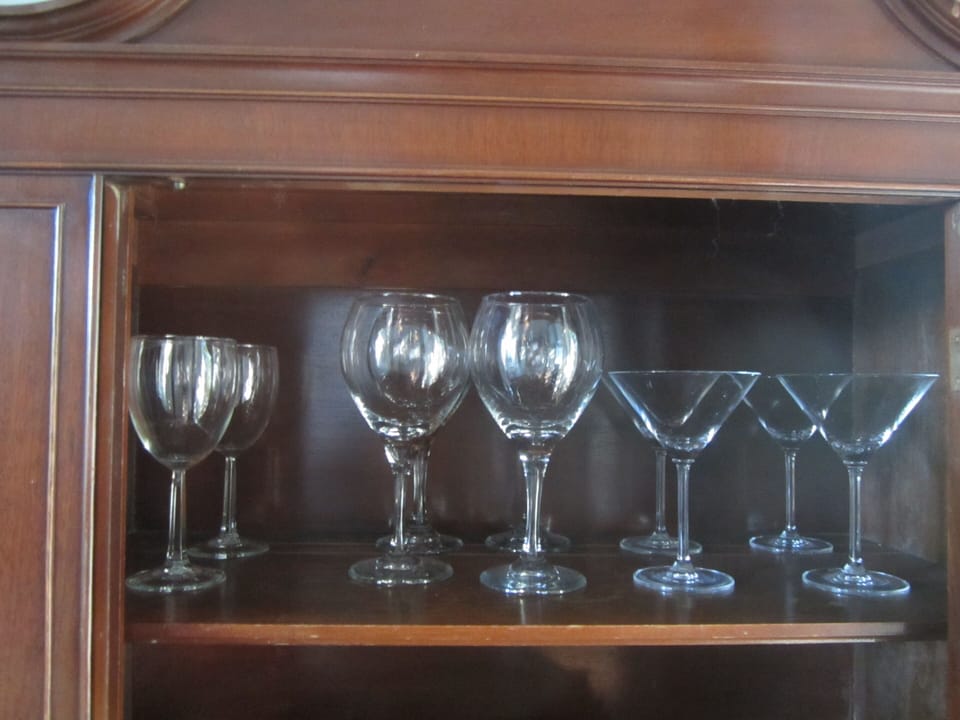Wine or a Martini? We also have dishes,  cups for 4 and a  full set of pots&pans