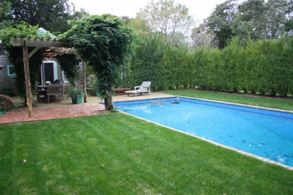 Very private heated pool and terrace with beautiful wisteria